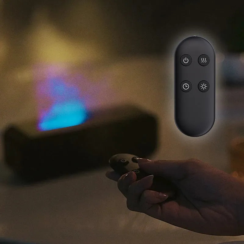 Black and white flame dynamic aroma diffuser with remote control on wooden table