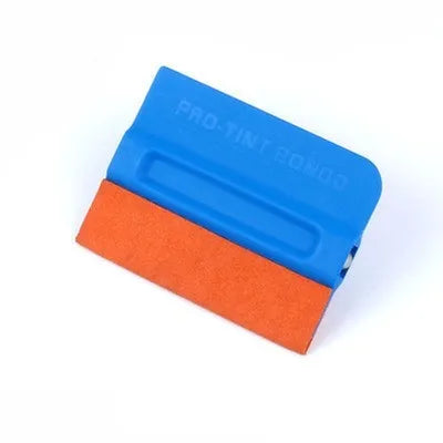 Car film scraper tool with ABS handle and four coloured scraping pads for vehicle wrap application.