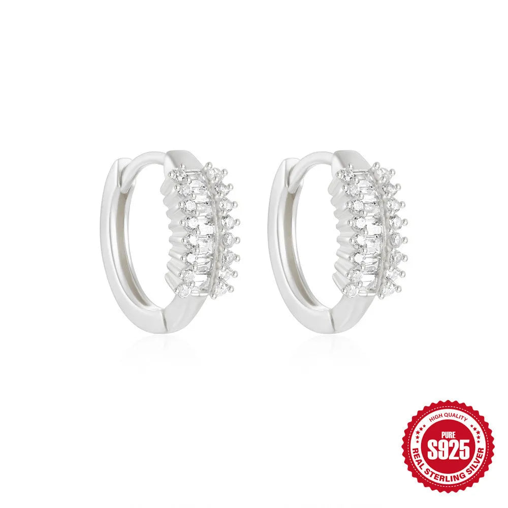 Sterling silver geometric stud earrings with small round designs in gold or silver electroplated finishes