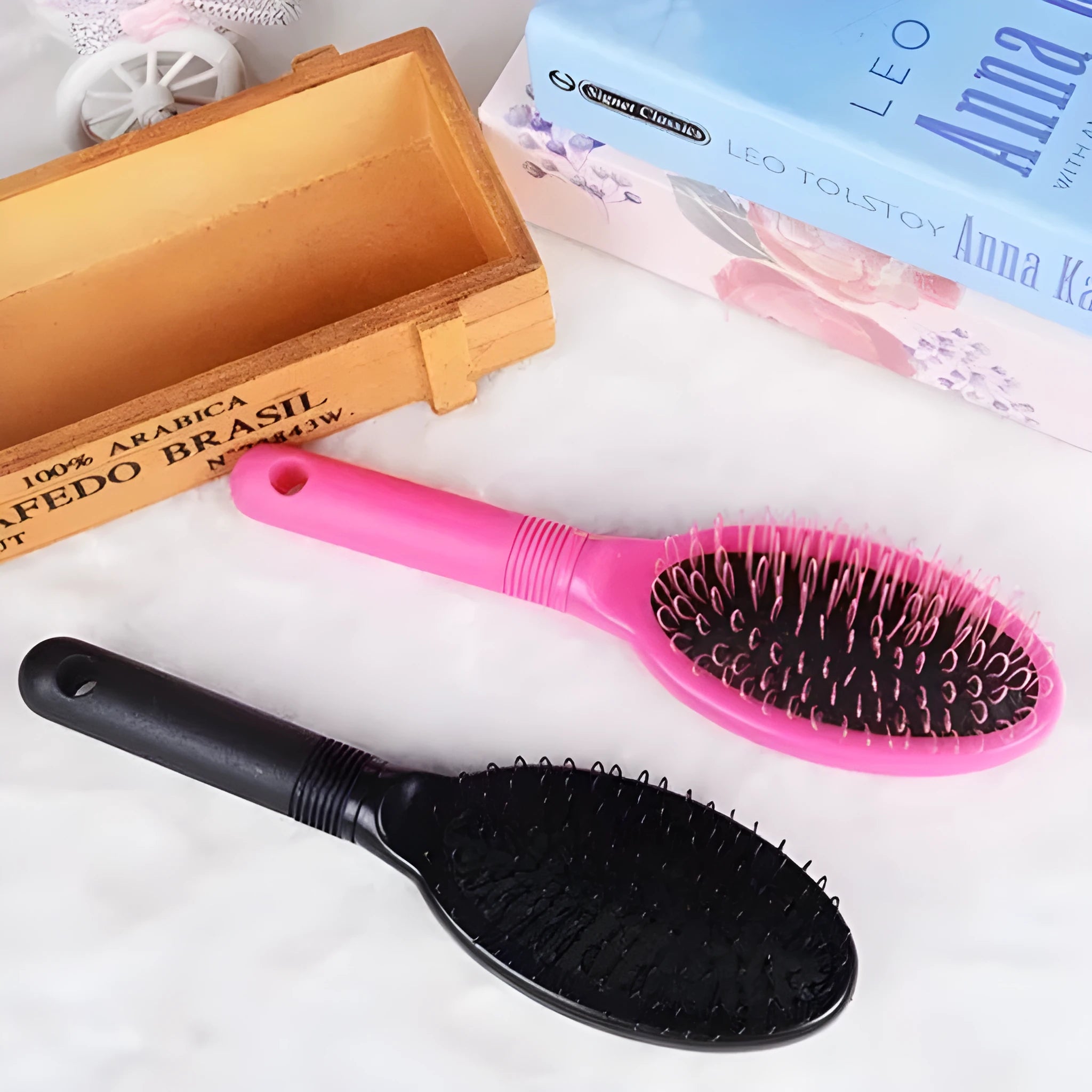 Black or pink plastic hair extension comb with ring teeth, 22cm length
