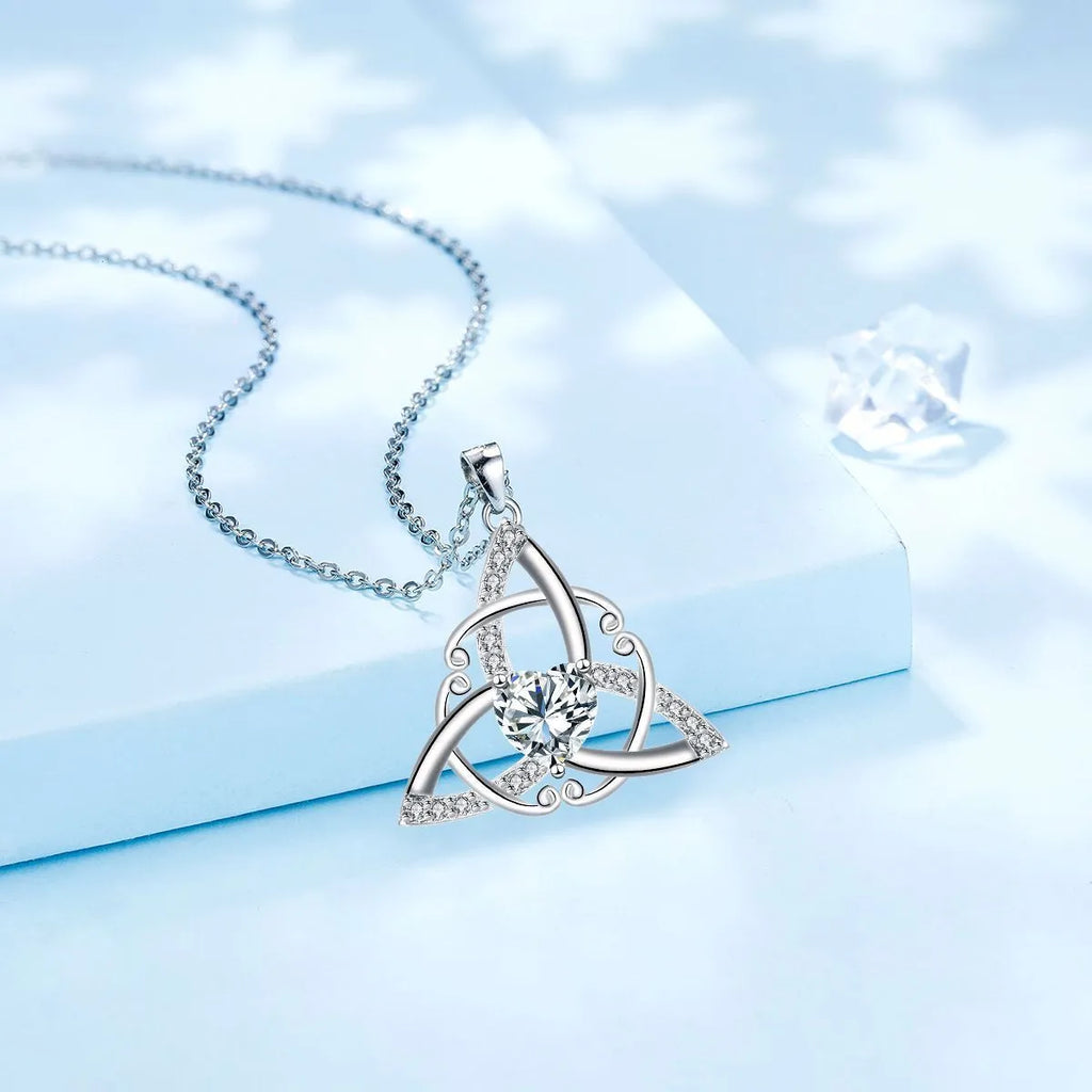 Copper Celtic knot pendant necklace in choice of electroplated colours: white, blue, green, or red.