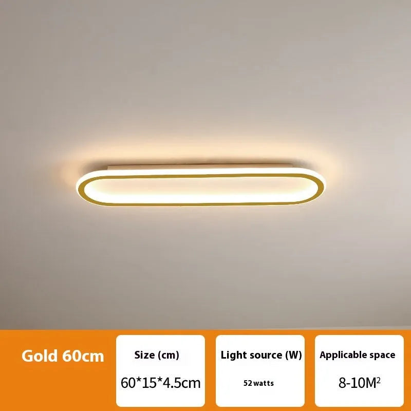 Black minimalist strip ceiling lamp mounted flush on a white ceiling.