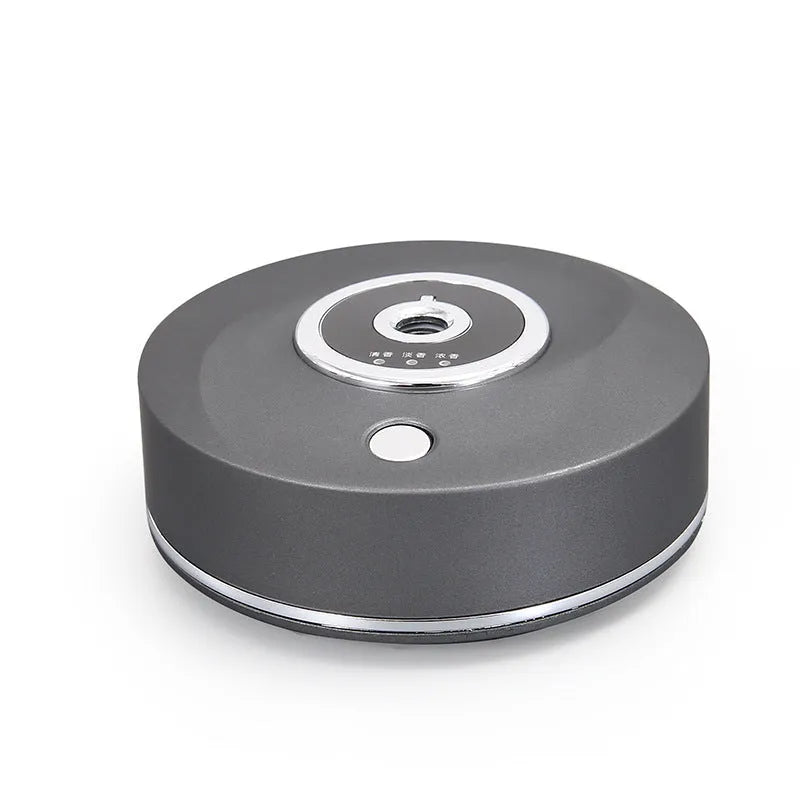 USB-powered plastic car air freshener holder in black, grey, or white colour with charging cable.