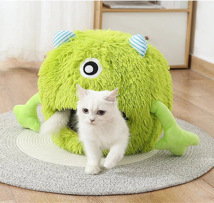 Round fluffy plush cat bed with non-slip base in three size options for indoor cats