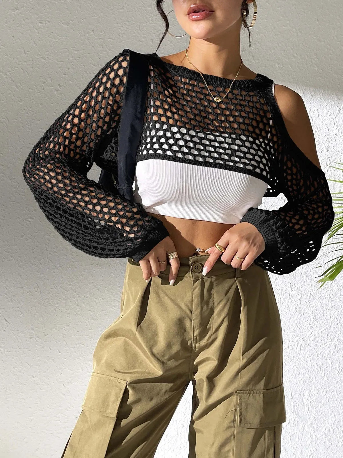 Mesh beach shirt with a hollowed navel section shown in multiple colour options.