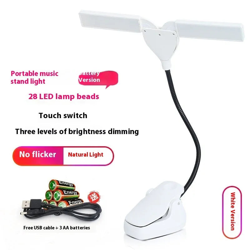 Black rechargeable music stand lamp with 28 LED lights and USB cable on a music stand.