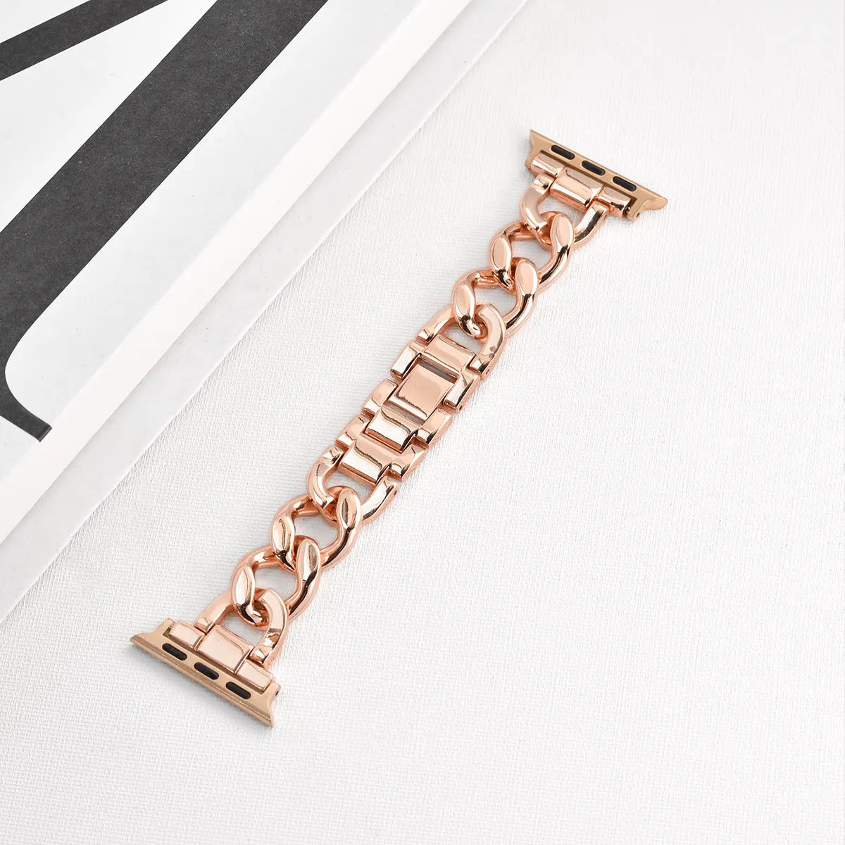 Denim chain link metal Apple Watch replacement strap in silver, black, gold, rose gold, and Starlight colours.