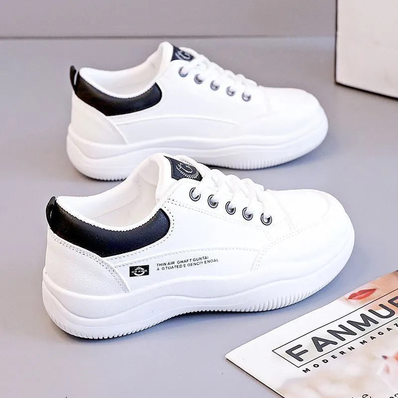 Women's white Korean-style lace-up pumps with cross straps and mid-heel design