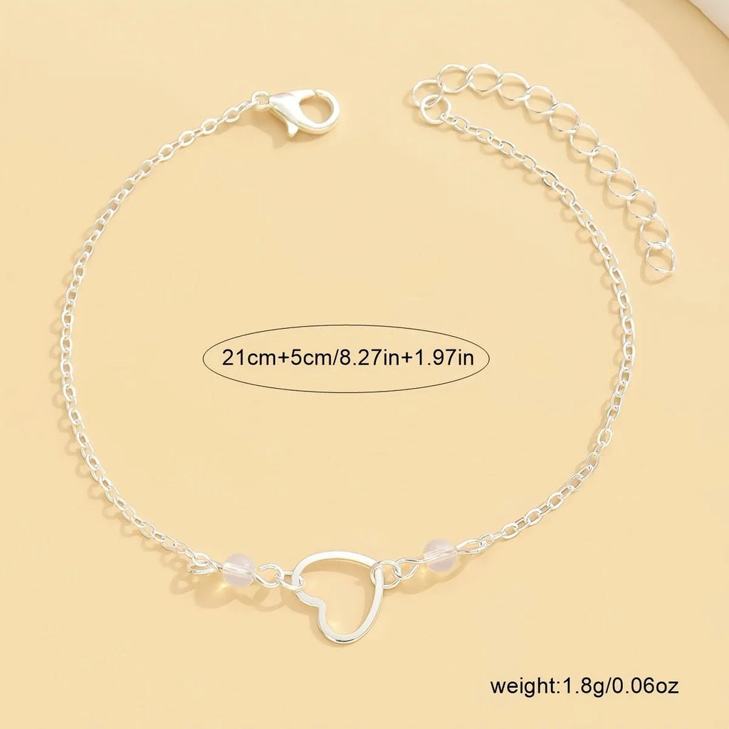 Women's adjustable ankle bracelet with geometric heart pendant in gold or silver alloy