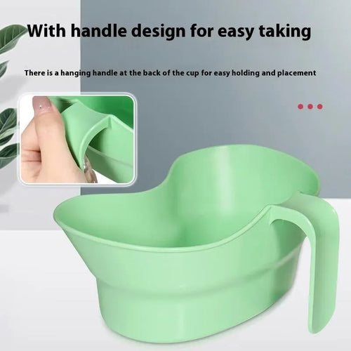Green plastic gargle cup for bedridden elderly patient oral care and hydration