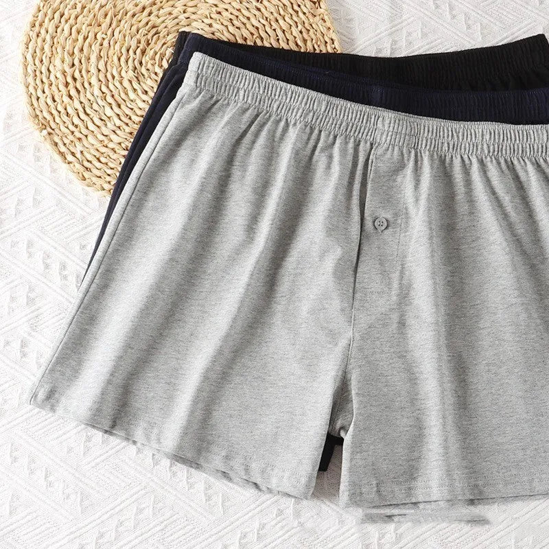 Men's light gray pure cotton high waist loose boxer shorts laid flat
