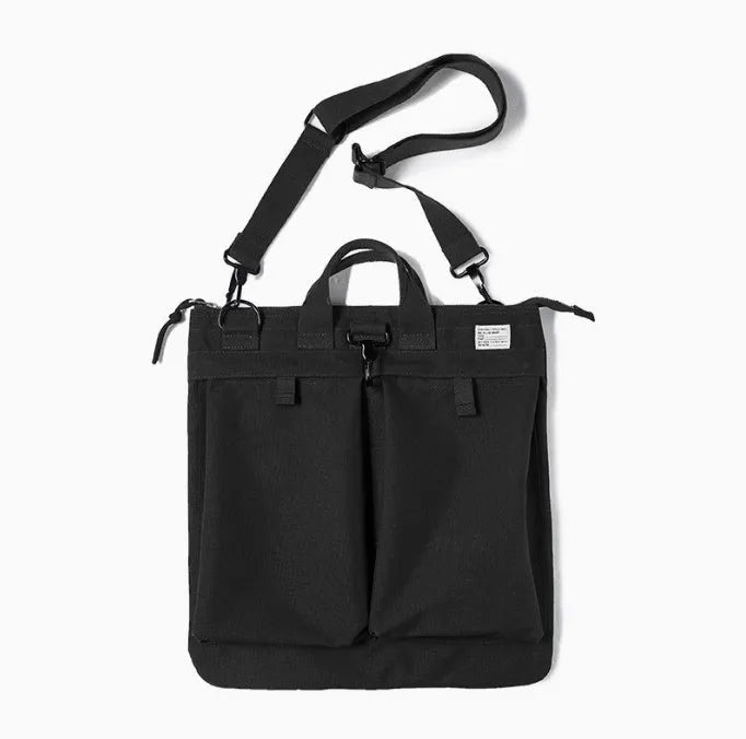 Marden Tooling charcoal black nylon canvas messenger bag with shoulder strap shown open.
