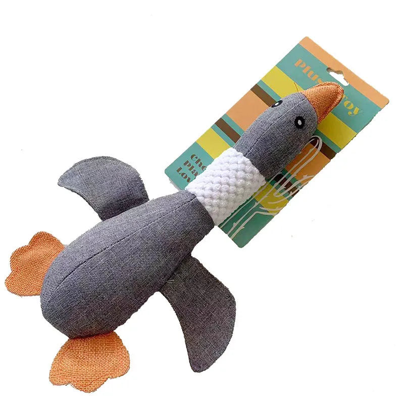 Blue duck-shaped plush dog toy with squeakers for chewing and play