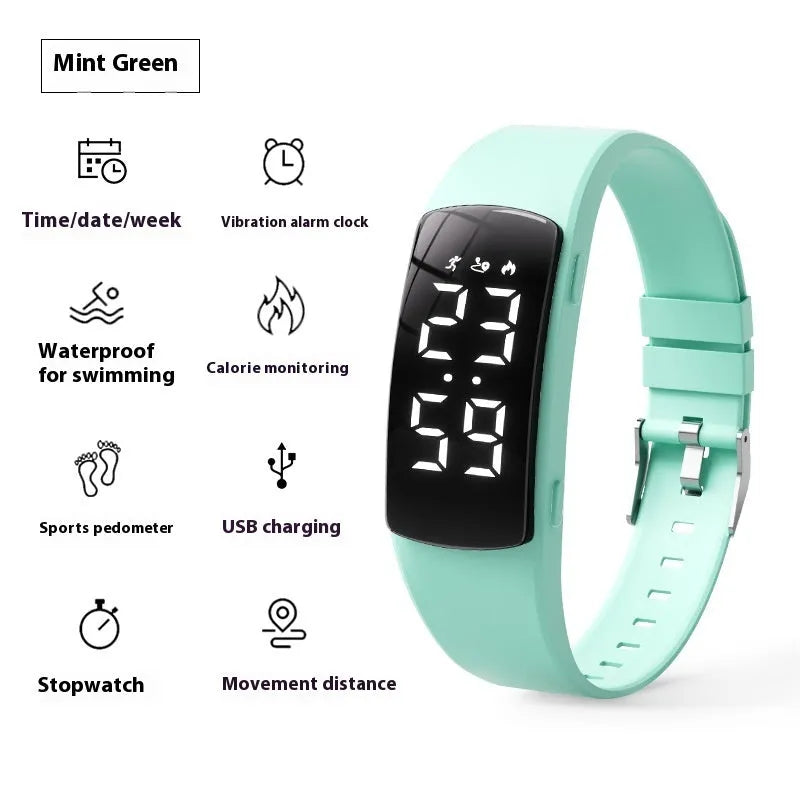 Waterproof vibration alarm clock watch with black silicone strap and LED display showing time