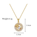 Women's geometric jewellery set showing necklace and earrings with ring and leaf designs in gold and silver tones