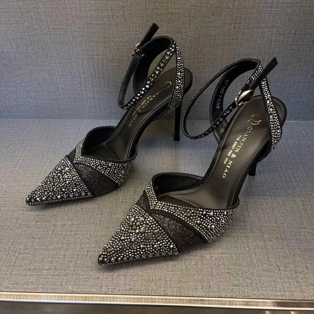 Women's silver and black stiletto heels with red sole and hollow design, pointed toe formal shoes