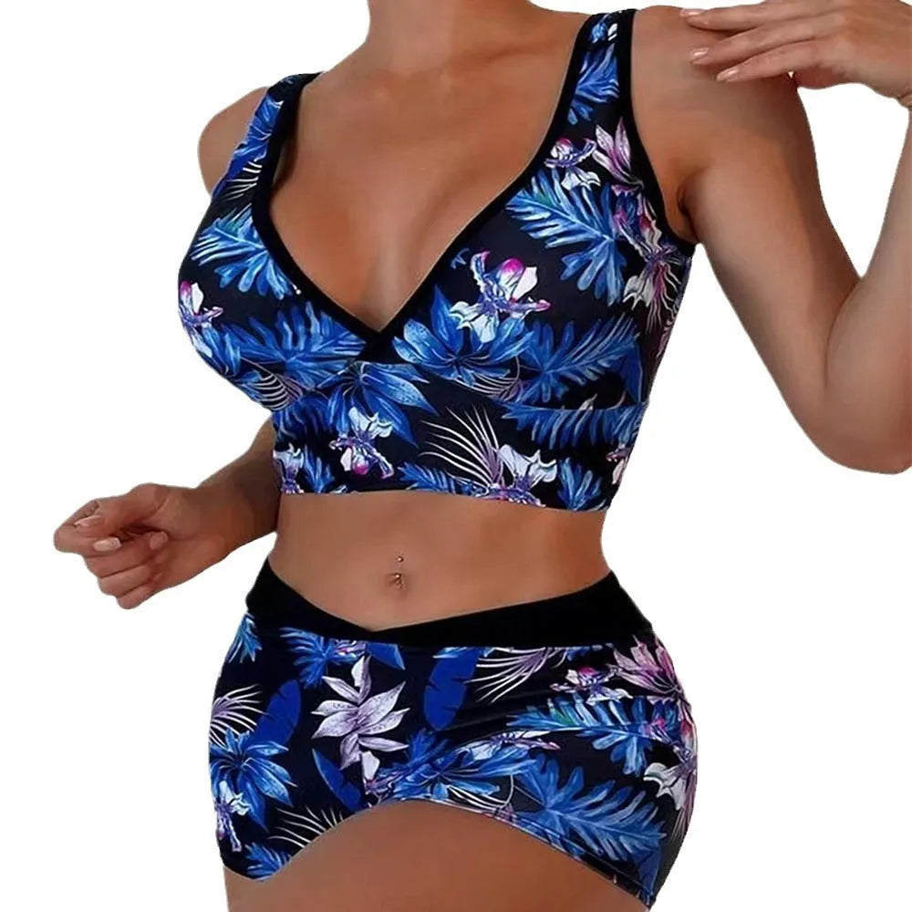 Women's two-piece sleeveless swimsuit with boxer shorts in a multi-colour print.