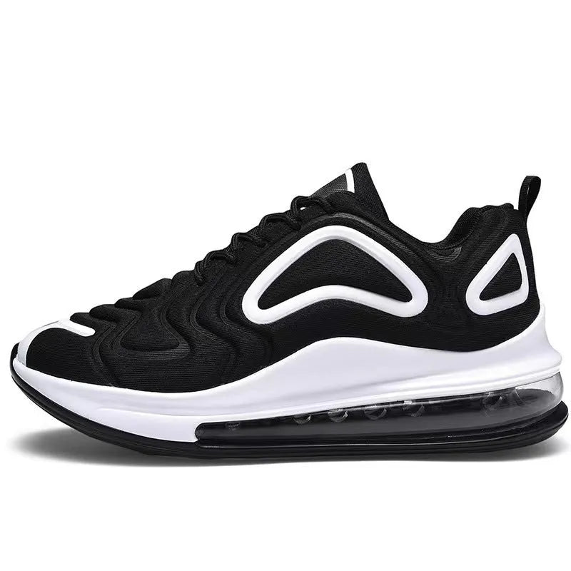 Men's black casual sneakers with lace-up front, thick sole, and round toe design