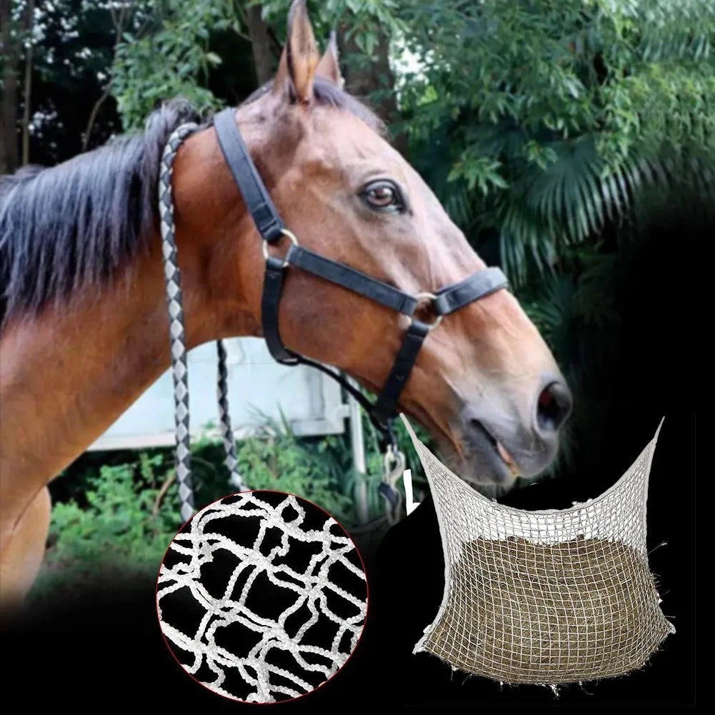 Black woven grid horse feeding bag hanging, filled with hay, for cattle or sheep.