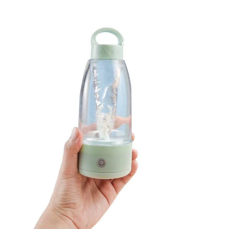 Automatic electric shaker bottle with USB port and handle in green, pink, or white