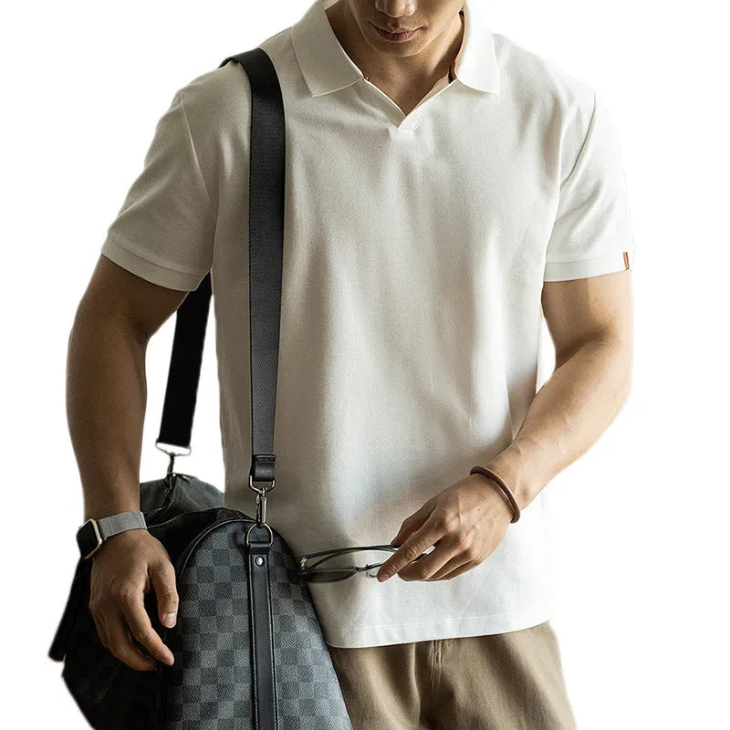 American-style cotton-polyester breathable short-sleeved polo shirt in blue colour showing regular fit and casual styling