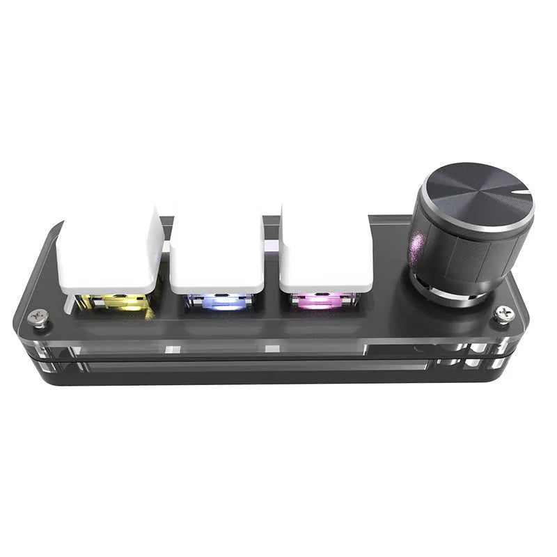 Black RGB backlit mini keyboard with copy and paste keys on desk