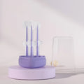 Soft silicone pet toothbrush for dogs and cats in purple, shown with flexible gel bristles for teeth cleaning.