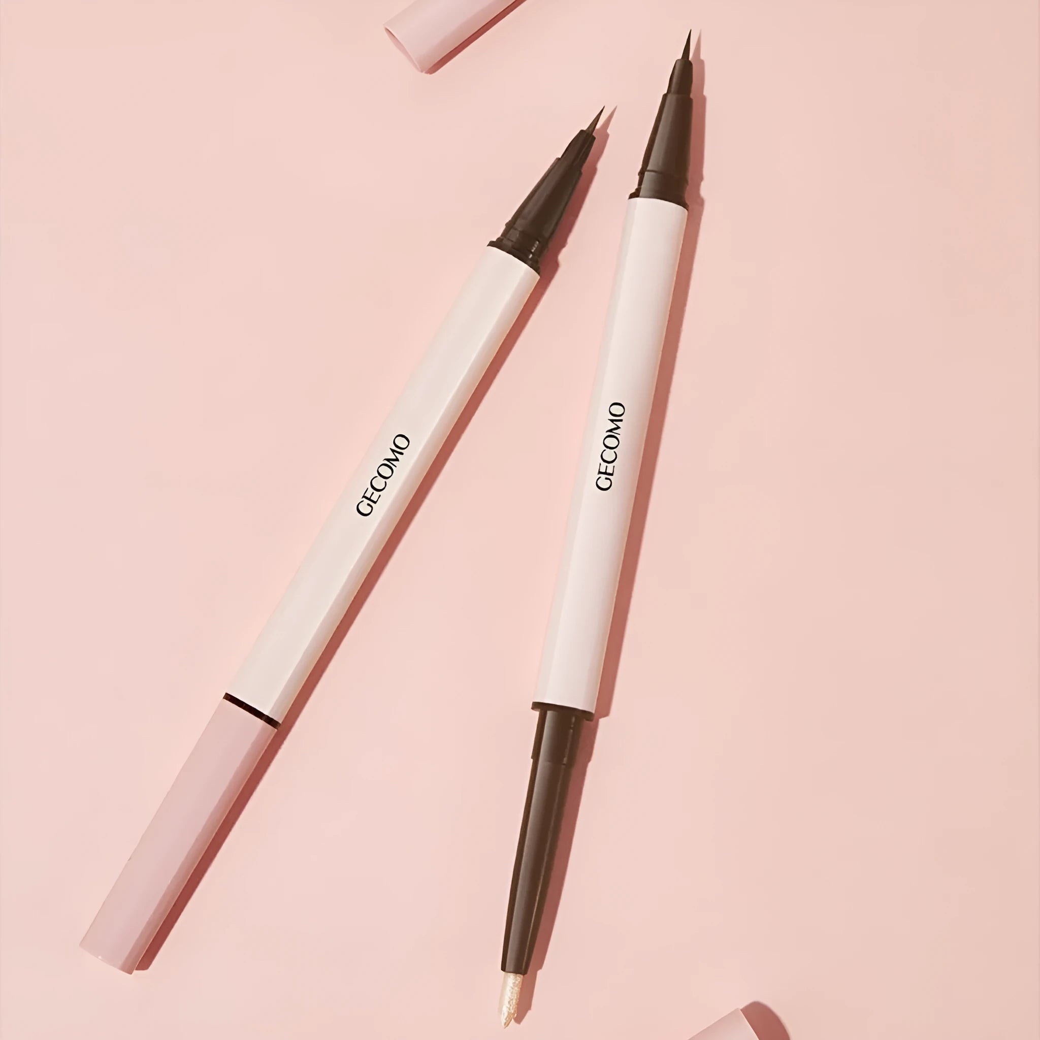 Liquid eyeliner pen with double headed silkworm brush tip in pearlescent colours