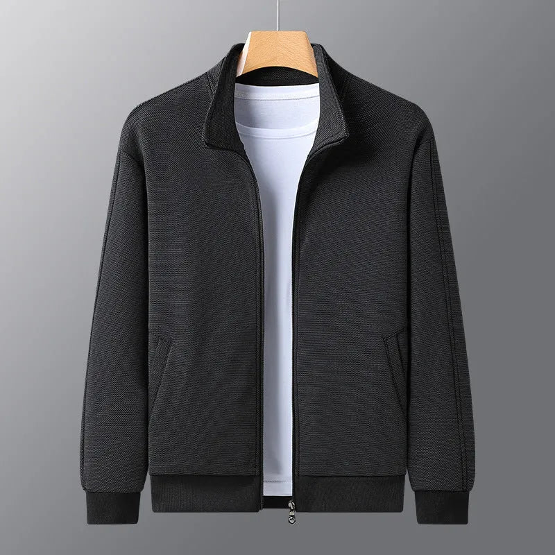 Men's black fitted casual jacket with a stand-up collar and zip front.