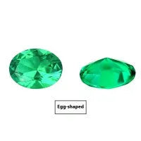 Loose cultivated emerald gemstone in Columbia green colour showing round and fancy cut shapes on a white background.