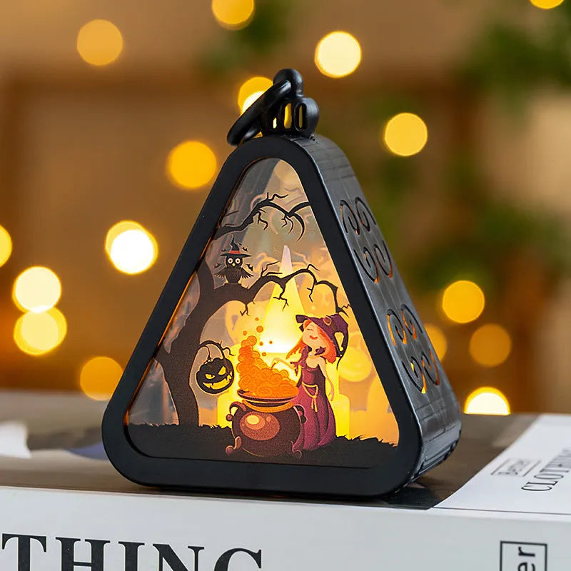 Portable Halloween pumpkin lamp decoration in plastic and glass with four colour theme options
