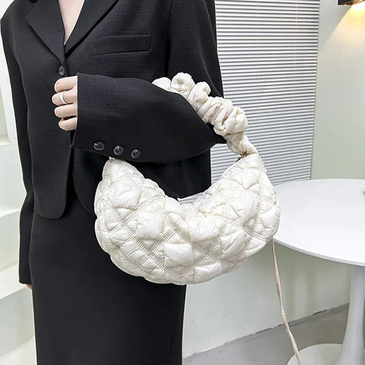 Women's casual nylon messenger bag in beige colour, showing front view with shoulder strap.