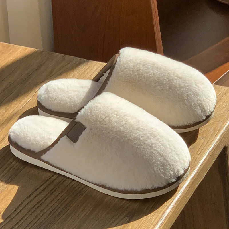 Solid colour winter plush slippers with PVC construction and non-slip sole