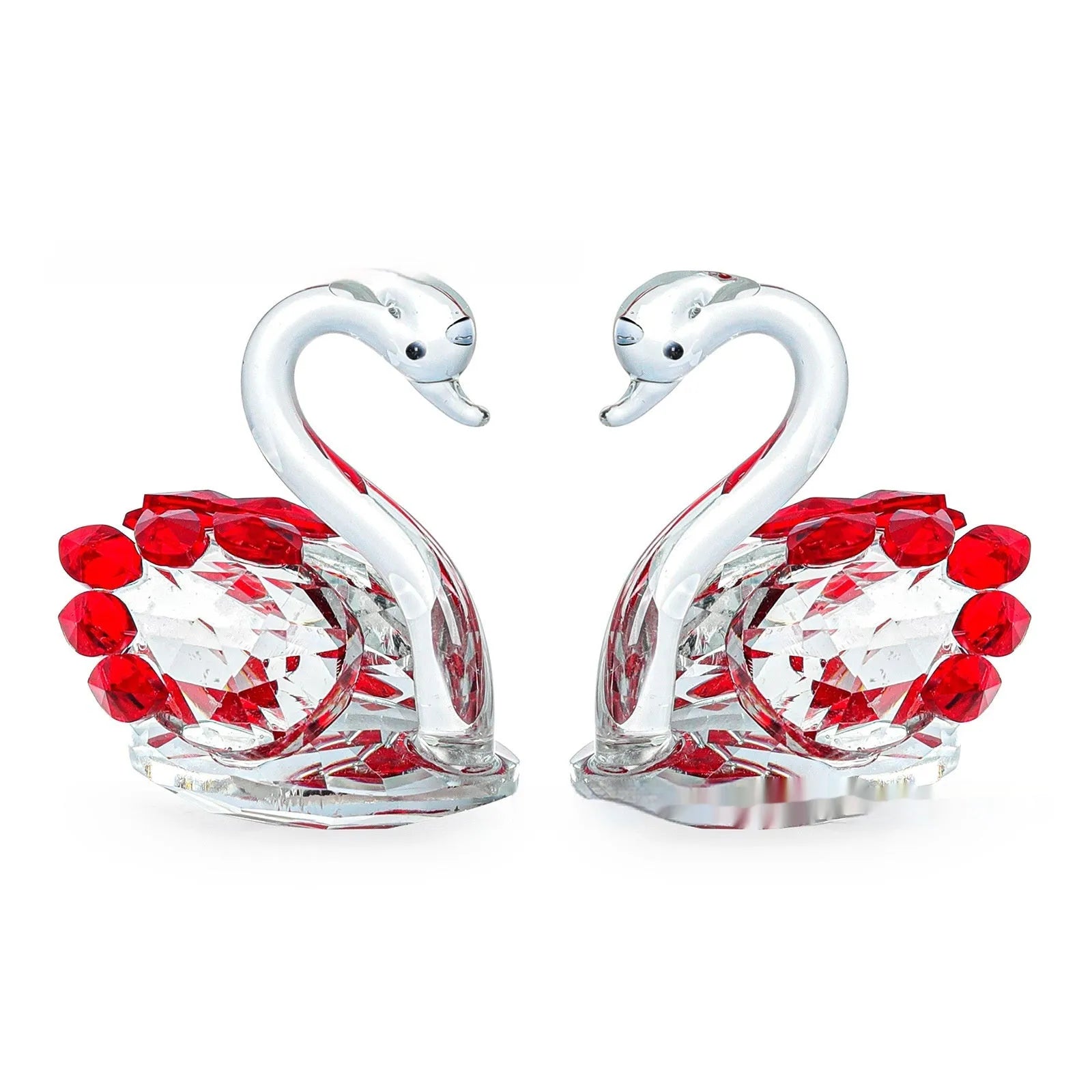 White crystal swan decoration on desktop with red, blue, pink, and violet colour options