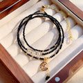 Women's blue sand stone three-ring multi-layer bracelet showing interconnected design
