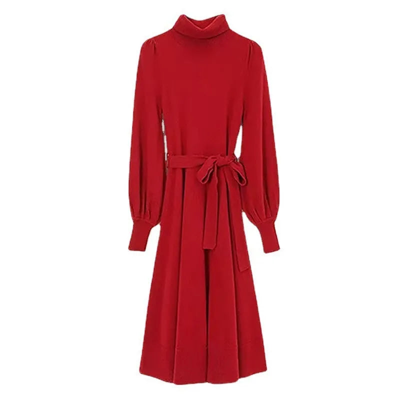 Women's knitted turtleneck dress with long sleeves, elastic waist, and a loose A-line skirt in a solid colour.