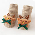 Cotton baby floor socks in various patterns including animal prints, stars, and bows for infants aged 0-3 months