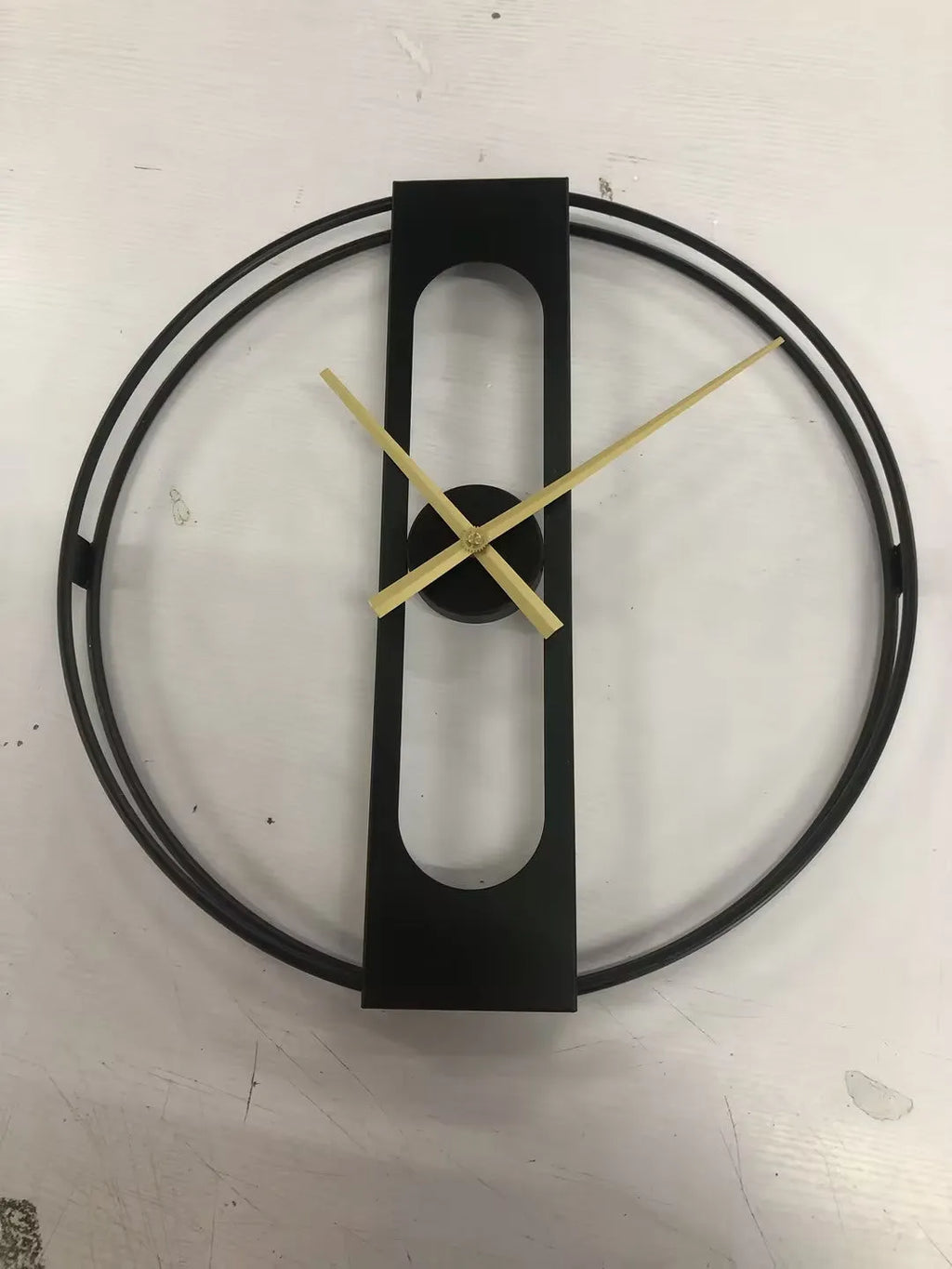 50cm round metal wall clock in gold or black finish with battery-powered operation