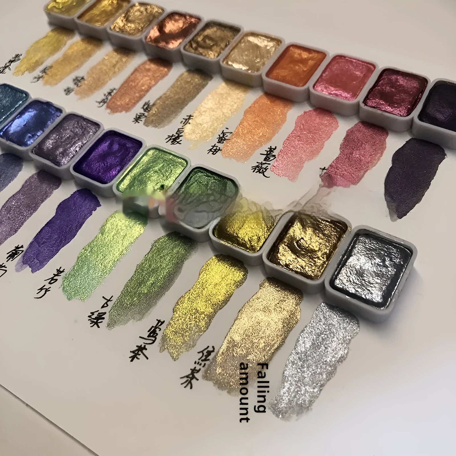 Traditional Chinese painting watercolour set with tubes of red, white, gold, and warm and cold colour palettes.