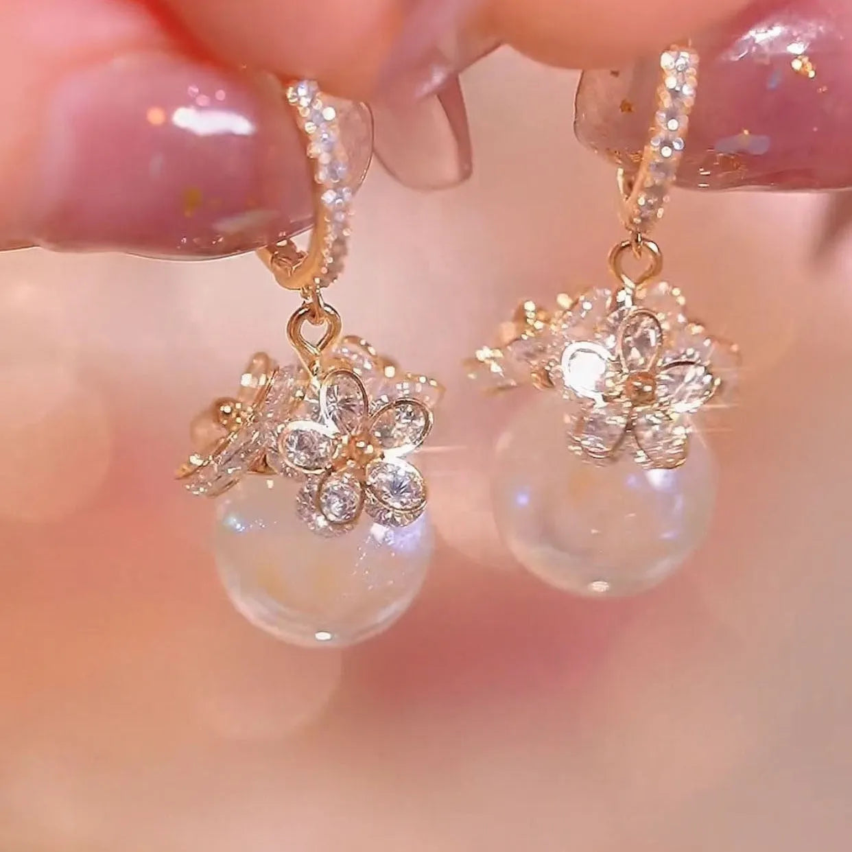 Geometric rose zircon earrings for women in copper with electroplated finish, shown in one of 11 available style variations.