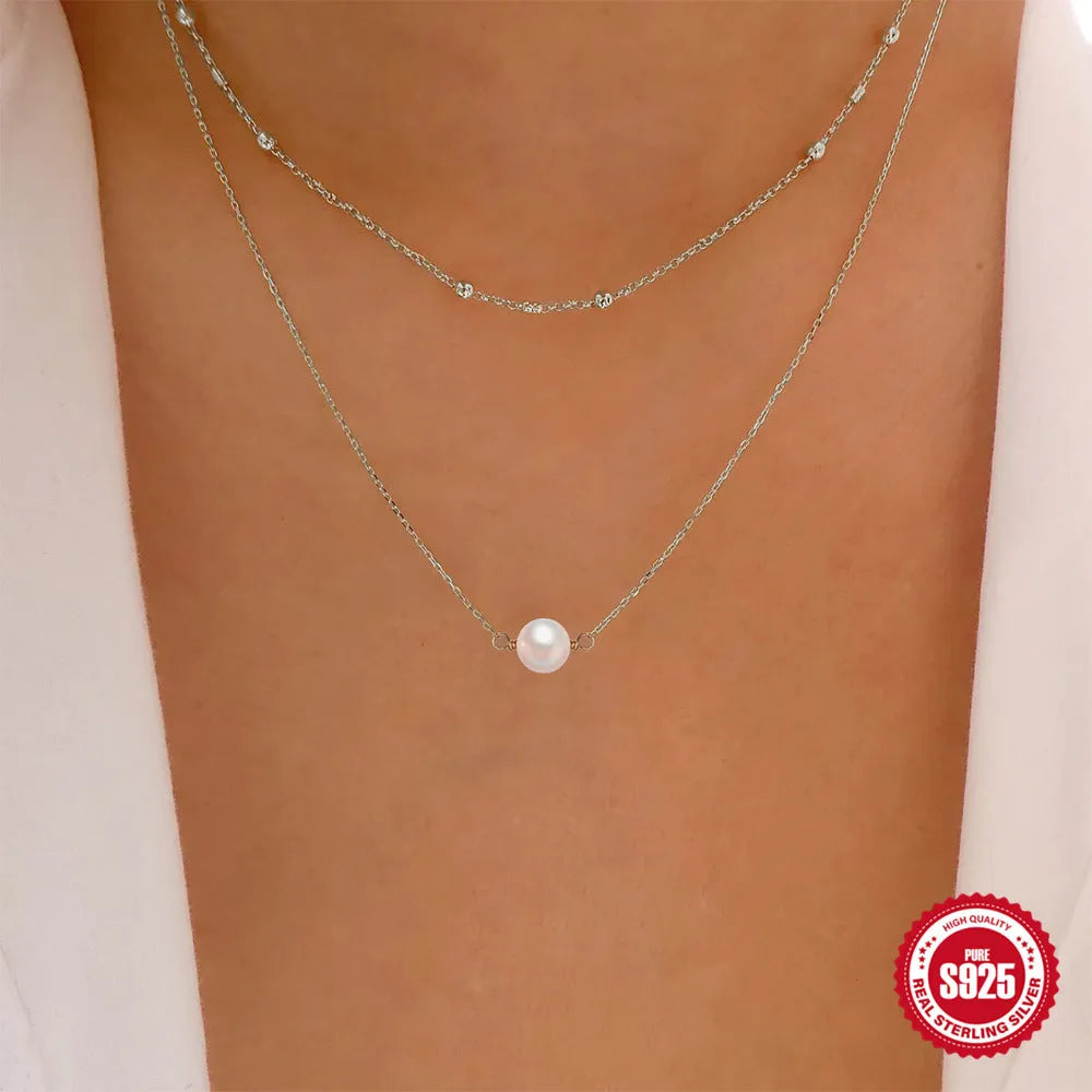 S925 sterling silver double layer necklace with twin pearls and geometric pendant in gold plating