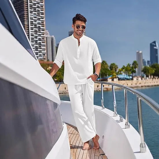 Men's casual cotton suit set in a solid colour, featuring a long-sleeved top and matching trousers.