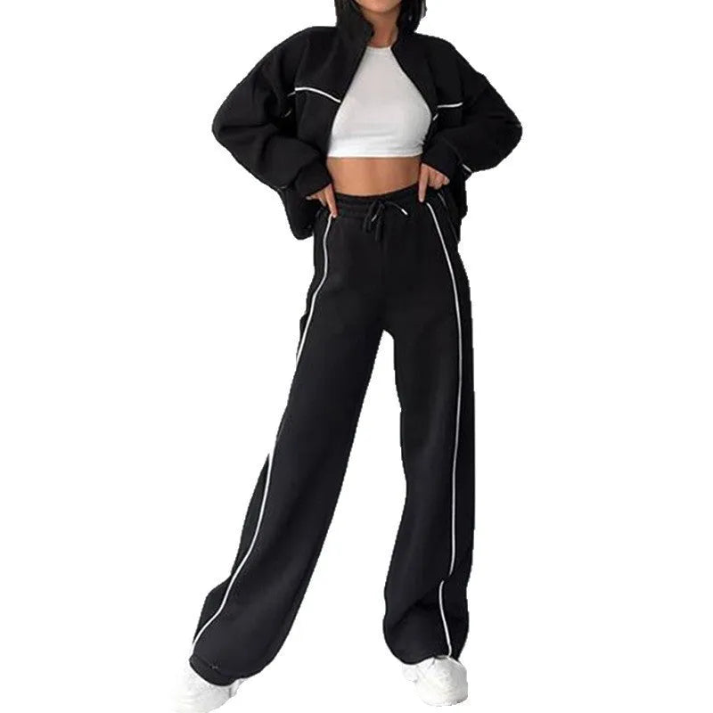 Casual polyester suit set showing a mock neck zip hoodie and matching striped trousers with lace-up detail.