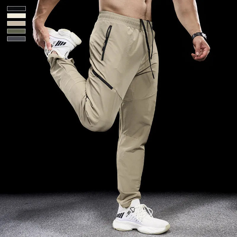 Men's waterproof quick-dry workout trousers in nylon fabric for sports and fitness