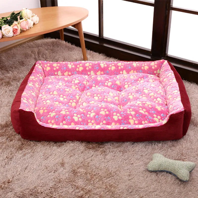 Soft beige plush dog bed with raised sides in a sofa-style design for small pets.