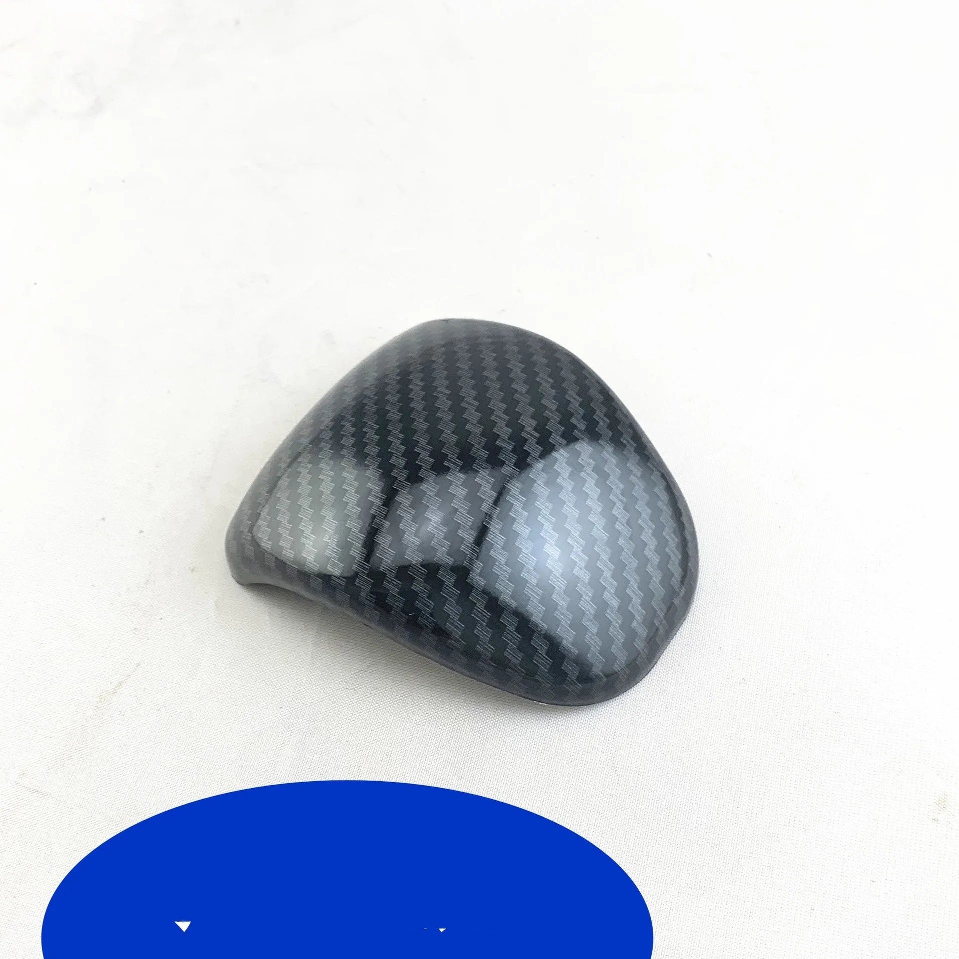 Carbon fibre pattern gear shift knob cover for smart Runk3 car interior.