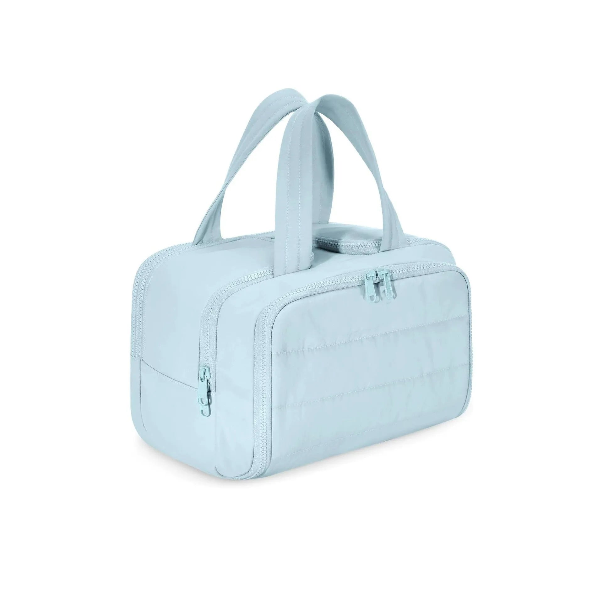 Large wide open travel toiletry bag in lightweight polyester with fluffy texture, showing interior space