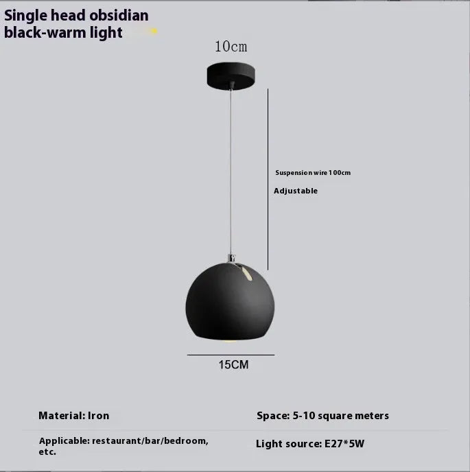 Modern Nordic-style ball chandelier table lamp in Moon White finish on a wooden surface.