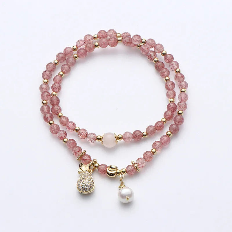 Women's strawberry quartz crystal bracelet with geometric design for money drawing and luck changing