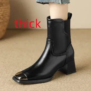 Women's brown Martin boots with high heel, side zipper, and decorative metal details on leather upper